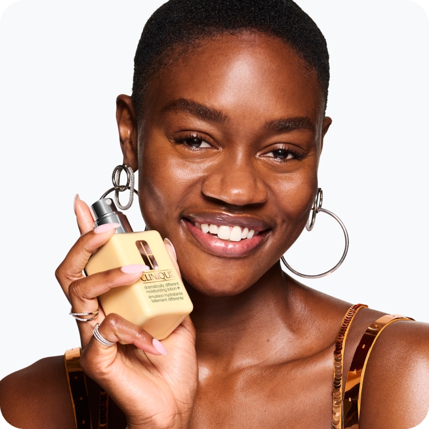 Selection of new brow and eye products dynamically placed on a glass shelf, in a brightly lit studio setting